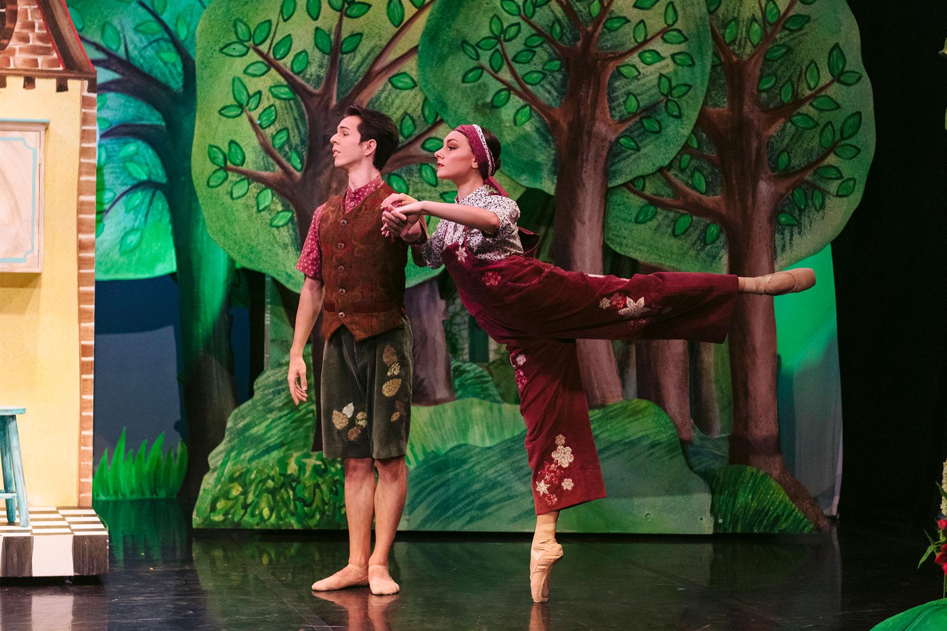 Little Red's parents look for their daughter, her mum in arabesque