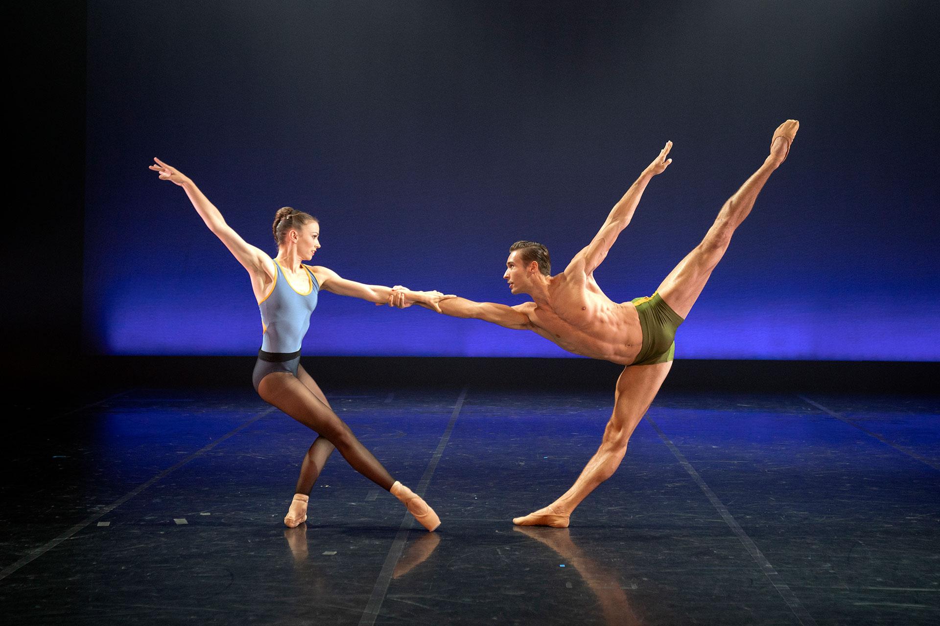Abigail Prudames and Joseph Taylor holding on to each other while pulling away
