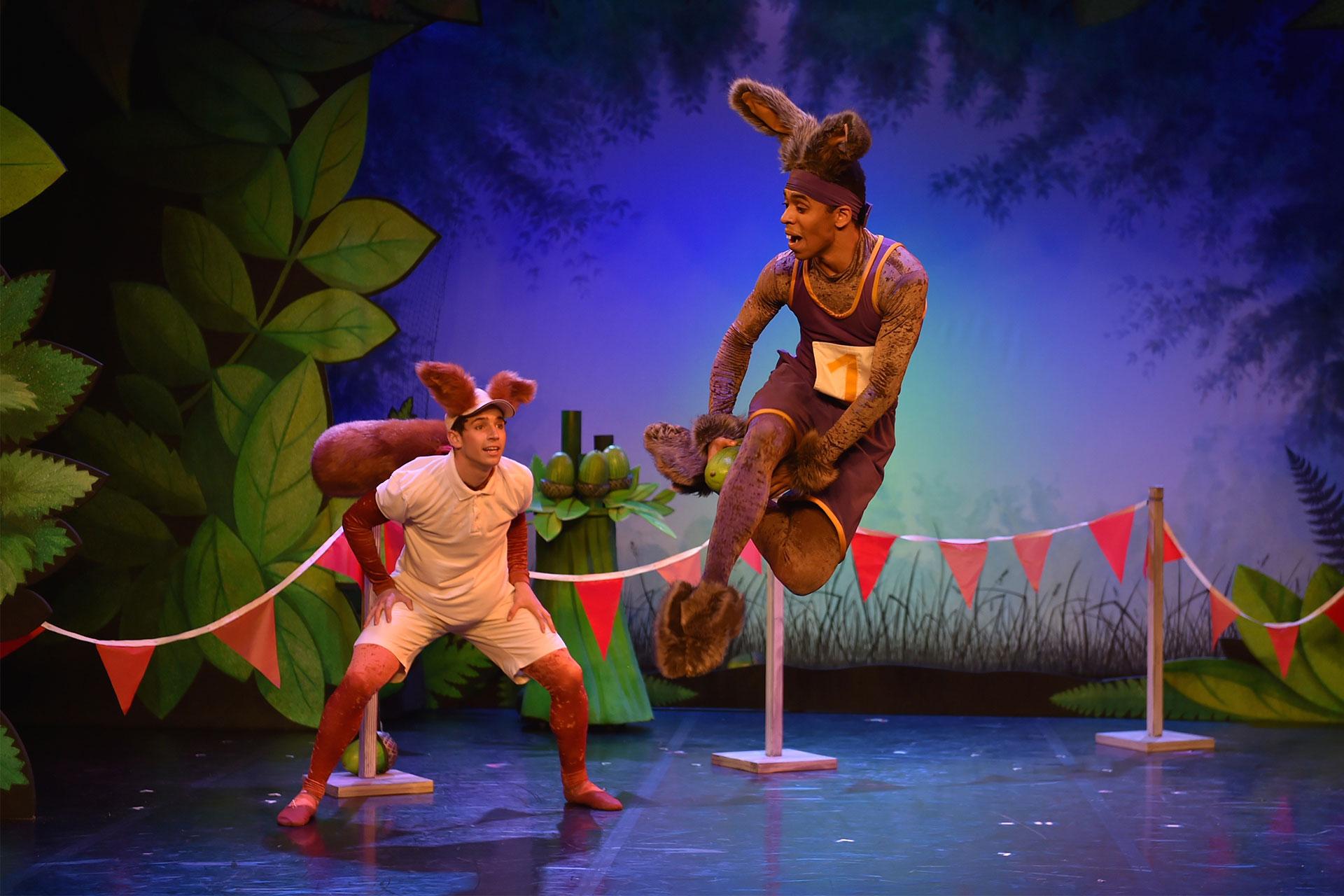 Hare skips and leaps while Squirrel looks on