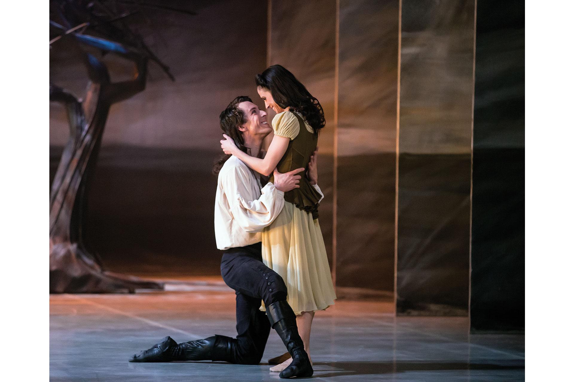 Totally besotted in one another, Heathcliff kneels and holds Cathy close