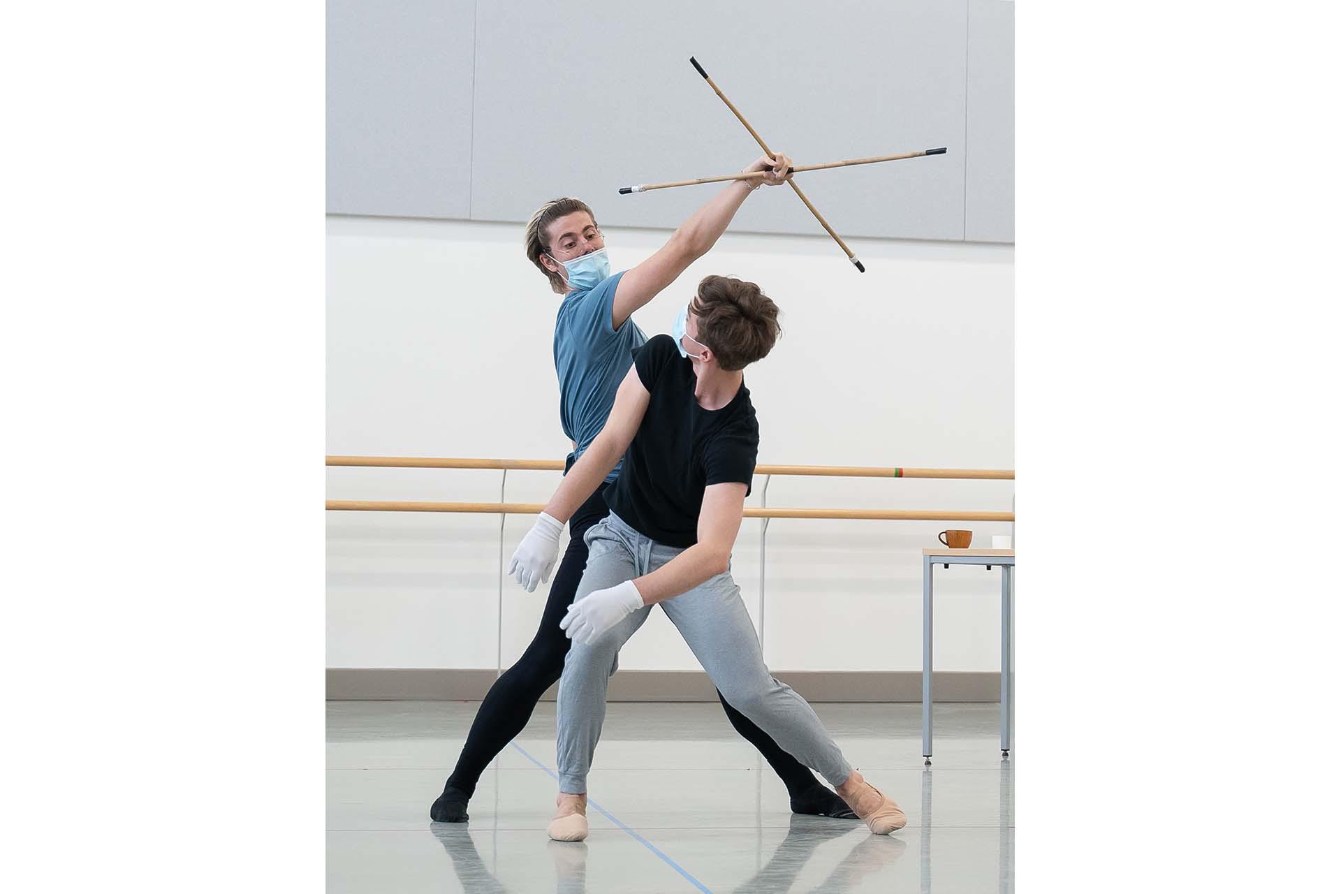 Pinocchio struggles against his strings being controlled by Gepetto