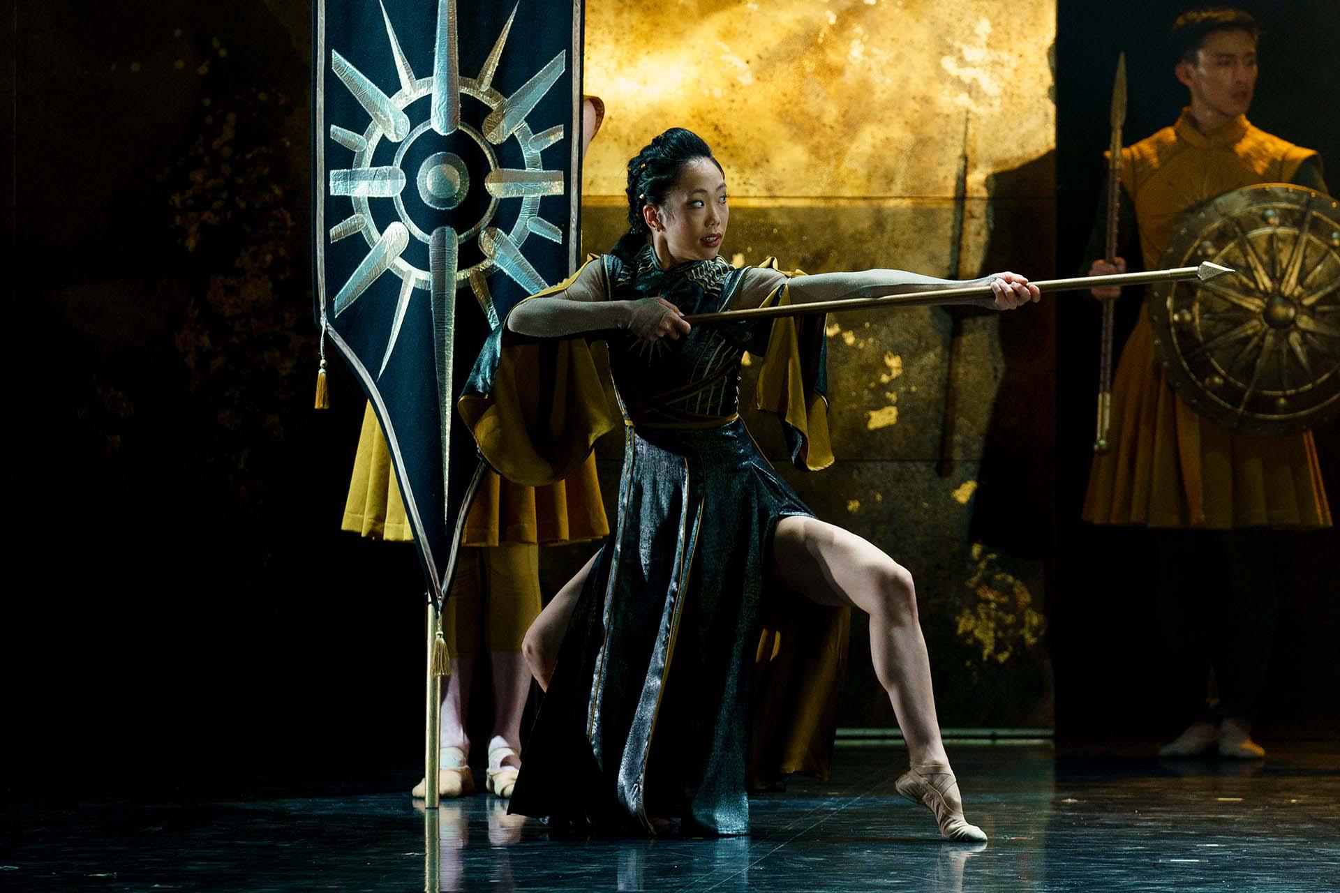 Morgan practices threateningly with her staff