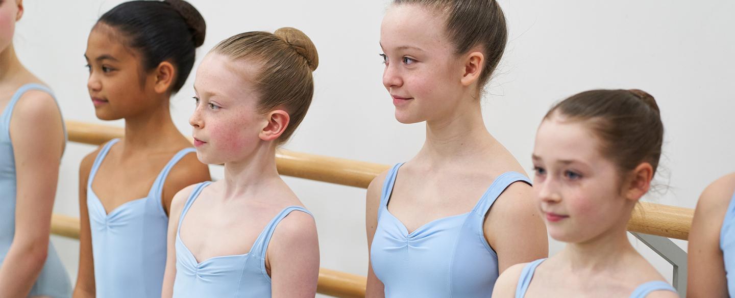 Ballet students stand in line