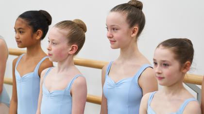 Ballet students stand in line