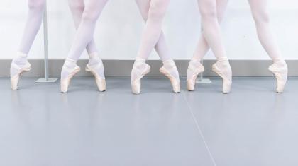 Four dancers stood on pointe